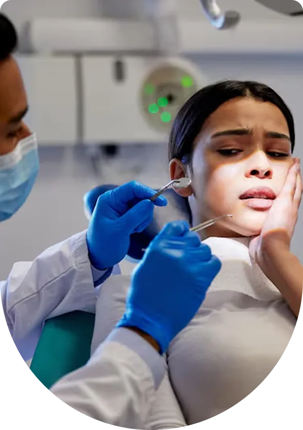 Dentist treating patient